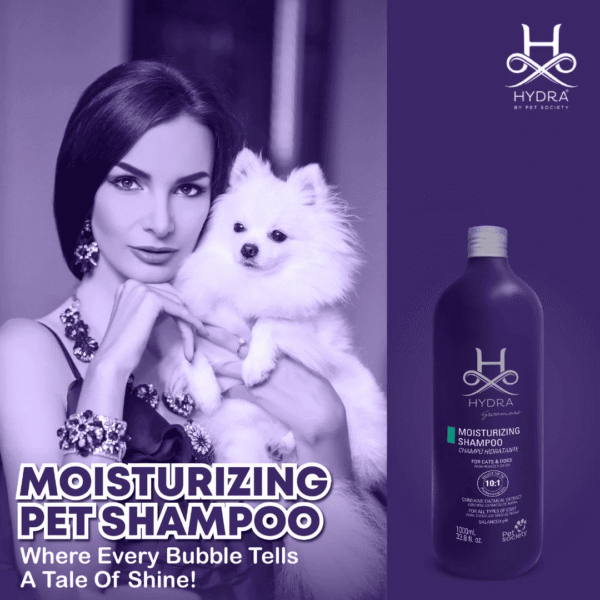 Hydra Groomers Moisturizing Shampoo 1L premium lifestyle ad – elegant woman holding white Pomeranian dog with tagline where every bubble tells a tale of shine